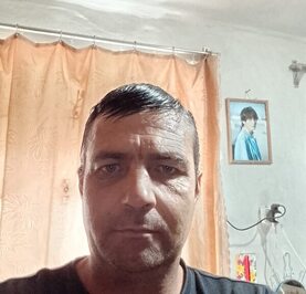 Николай